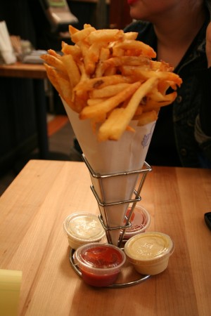 Belgian sized pommes frites with "Vampire Slayer" mayo, "Saturday Night Chive," Truffle Ketchup, and Curry Ketchup. Photo by Deb Singer