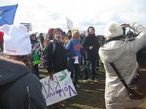 A protester with a Harry Potter themed sign. | Photo by Ari Stern