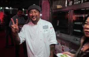 Roy Choi posing at the LAFW: Los Angeles Food & Wine Festival | Photo courtesy of Guzzle & Nosh