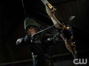 Stephen Amell poses in an early shot from the series | Promotional photo from http://www.cwtv.com/shows/arrow/