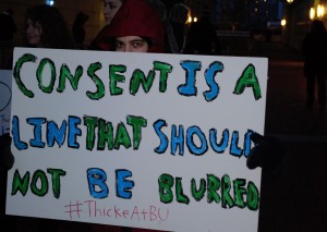 A protester takes issue with Robin Thicke's "Blurred Lines."
