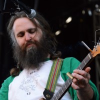 Brett Netson of Built to Spill plays with lit cigarette on his guitar | Photo by Kara Korab