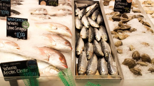 Whole Foods Market in Alewife Brook Parkway, Cambridge, Mass. displays an assortment of sustainable fish, including whole lane snapper, arctic char, mackerel and wild littleneck clams. | Photo by Michelle Marino