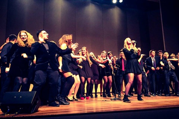 Kaye Hutchinson, In Achord president, belting out a solo at the ICCA. | Photo by Marrit Nowak